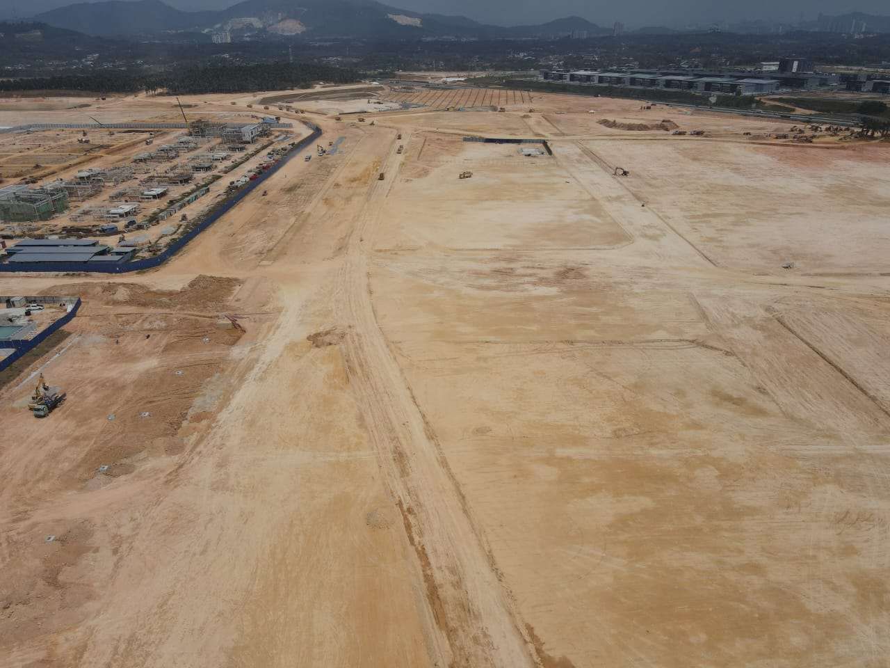 Aerial view of large earthworks platform under construction