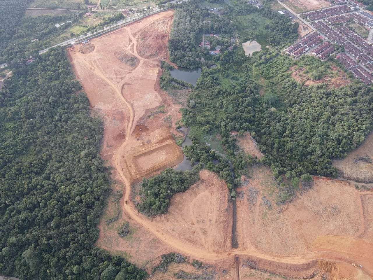 Aerial view of site clearance and earthworks at Wakaf Tapai Innovation Park
